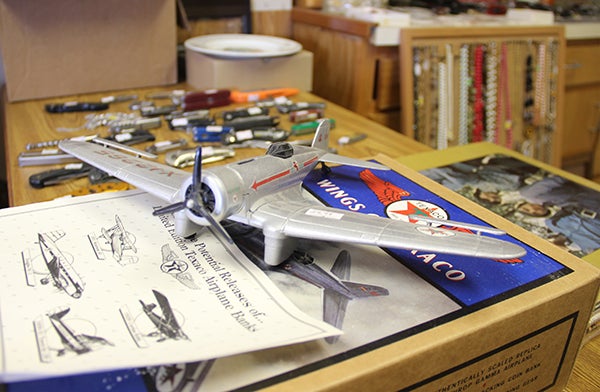 This model airplane was one of several items for sale in Pick & Dig Treasures on Saturday on Clark Street. The business, which offers antiques and collectibles, opened a week ago. – Sarah Stultz/Albert Lea Tribune