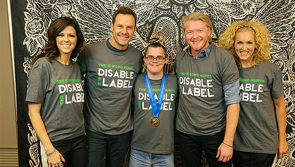 Kellen Kaasa of Albert Lea presented the band Little Big Town with Minnesota Special Olympics “End the R-Word” T-shirts, and he will sell the shirts from 3:30 to 6:30 p.m. Wednesday at Northbridge Mall. Proceeds go to Minnesota Special Olympics. From left are Karen Fairchild, Jimi Westbrook, Kaasa, Phillip Sweet and Kimberly Schlapman. — Submitted