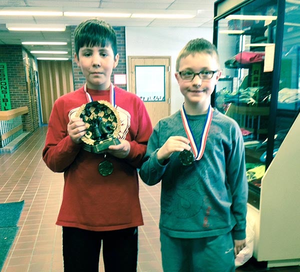 Thirty students participated in the second annual “Check It Out” chess tournament on March 22. Brechin Hoechst, a Lakeview Elementary student, came in first, with Seth Petersen, a Hayfield student, coming in second. In third place were Will Isaacson from Sibley Elementary, and Ethan Battle from Halverson Elementary. Sportsmanship winner was Ava Corey-Gruenes from Lakeview. Her name was drawn from a group of 12 students who displayed exceptional sportsmanship traits. Pictured are the first-and second-place winners, Breckin Hoechst, left, and Seth Petersen. – Submitted