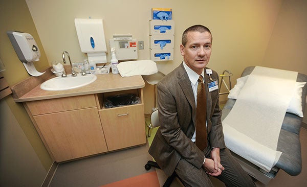 Mayo Health Systems in Austin and Albert Lea CEO Dr. Mark Cito sits in an examination room of the newest hospital expansion. Ciota has been in the mix as changes and improvements sweep over the hospital and looks forward to what may be coming down the stretch. – Eric Johnson/Albert Lea Tribune