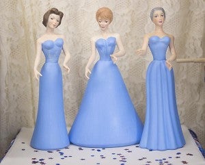 Seath casts, molds and fires each of the ceramic dolls before painting and airbrushing their face details and sewing their gowns. – Colleen Harrison/Albert Lea Tribune