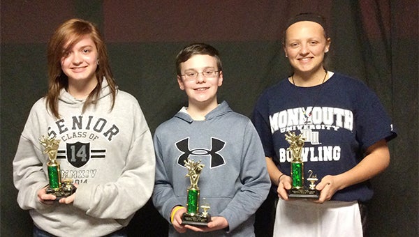 The trio of Rachel Reichl, Landon Kirchner and Bree Tlamka took second place as a team in the Friday Night McDonald’s League at Holiday Lanes. From left are Reichl, Kirchner and Tlamka. — Submitted