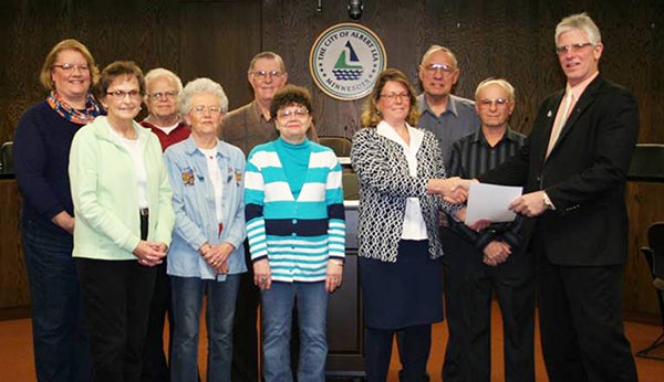 Tuesday was Mayor’s Day of Recognition for National Service. In Albert Lea the Retired and Senior Volunteer Program of Senior Resources of Freeborn County falls under that category. Mayor Pro Tem Larry Baker honored their volunteers at the last Albert Lea City Council meeting. Pictured are: Annette Petersen, Senior Resources director, Jan Henschel, Kyle Olson, Rose Olson, David Gray, Jerri Fogal, RSVP Director Carrie Paulson, Bruce Owens, Wayne Inderlie and Baker. For more information on the program, contact Senior Resources at 377-7433. – Submitted
