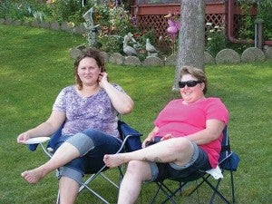 Nyla Anderson, left, before losing 60 pounds. – Submitted