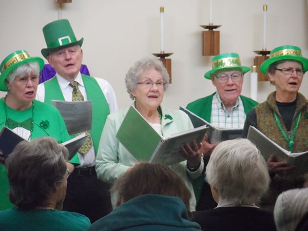 St. John’s Lutheran Community residents celebrate St. Patrick’s Day with a performance from The Young Oldies from Austin. – Submitted