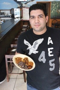 Lyan Martinez loves to share his food. – Tim Engstrom/Albert Lea Tribune