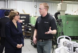 U.S. Sen. Amy Klobuchar talks with a Lou-Rich employee Thursday afternoon during a tour of the plant. – Sarah Stultz/Albert Lea Tribune