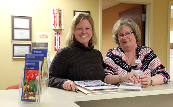 Jennifer Westerlund, left, and Marietta Stein stand in the Hospice department at Mayo Clinic Health System in Albert Lea. Westerlund and Stein will be running Albert Lea’s first day camp for teens and children who have experienced a loss. – Tiffany Krupke/Albert Lea Tribune