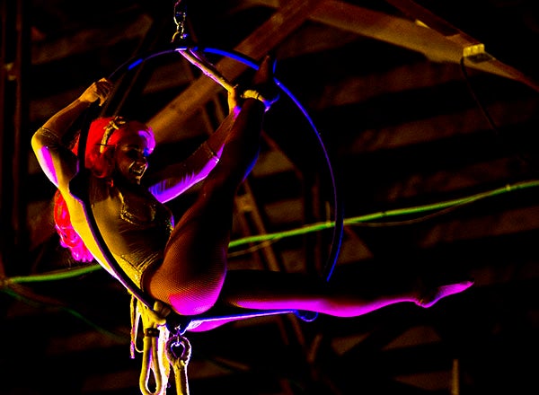 One of Circus Pages’ acrobatic mermaids performs Wednesday during the circus at the Freeborn County Fairgrounds. Four mermaids performed tricks using hoops and ropes that lifted them up in the air. – Colleen Harrison/Albert Lea Tribune