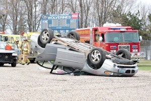 Several agencies helped Glenville-Emmons High School with a mock crash Friday as a reminder to practice safe driving. -- Brandi Hagen/Albert Lea Tribune