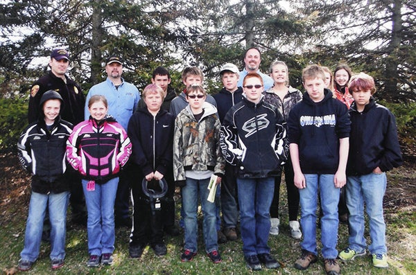 Students that completed the Minnesota Department of Natural Resources youth ATV safety training course April 26 in Clarks Grove. Back row, from left, are instructors Brent Ihnen and Scott F. Peterson, Christopher Ruby, Hunter Knutson, Jaxon Heilman, instructor Troy Waldemar, Hannah Nelson, Madison Nelson and Taylor Lunning. Front row, from left, are Noah Alinder, Sophie Alinder, Cody Hall, Mason Johnson, Seyd Straube, Tayler Fischer and Dylan Hall. – Submitted
