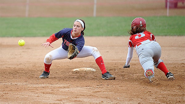 Megan Kortan of Albert Lea tries to stop Bailee Brooks from stealing second base Thursday against Austin at the Hammer Complex. Albert Lea won both games of a doubleheader. — Micah Bader/Albert Lea Tribune