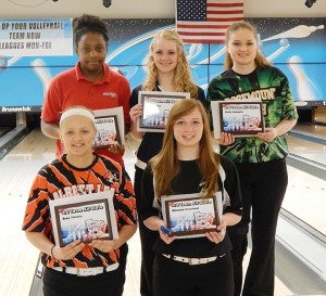 Bree Tlamka, front row left, holds a plaque April 26 at Southway Bowl after being a Third Team All-State selection. — Submitted  