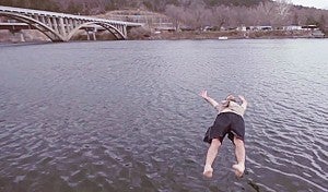 Screenshot from a YouTube video of a “cold water challenge” jumper in Lake Taneycomo in Missouri.