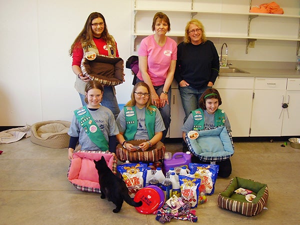 Girl Scout Troop 44836 donated supplies and toys to the Freeborn County Humane Society. The girls purchased the items with funds raised from cookie sales. – Provided