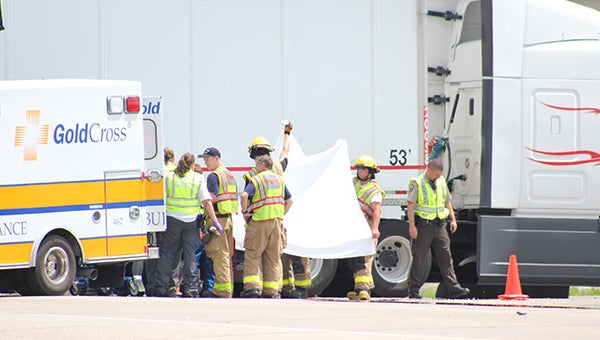 Gold Cross ambulance crews, the Albert Lea Fire Department and Freeborn County Sheriff's Office respond to a crash at the intersection of Interstate 35 and Freeborn County Road 46 on Friday afternoon. — Sarah Stultz/Albert Lea Tribune
