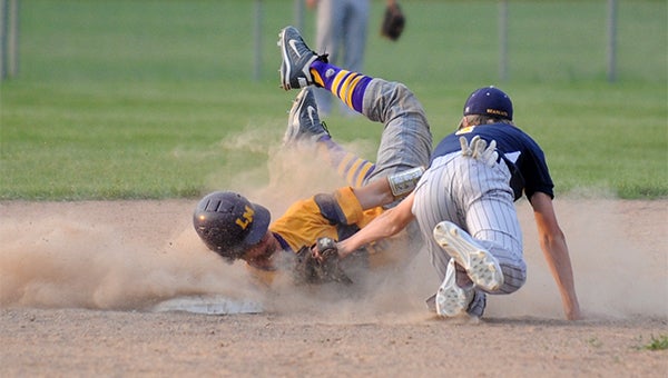 Josh Peters of Lake Mills attempts to steal second base Friday at home against North Butler. — Micah Bader/Albert Lea Tribune