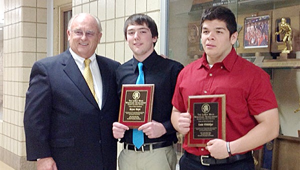The LeRoy Maas wrestling scholarship was awarded to seniors Bryce Hoyt and Luis Hildago May 28 at the Albert Lea wrestling awards banquet. The scholarships were presented by Lyman Steil and Pete Veldman. Maas died on May 10, but his scholarship fund will continue to assist Albert Lea wrestlers pay for college. — Provided