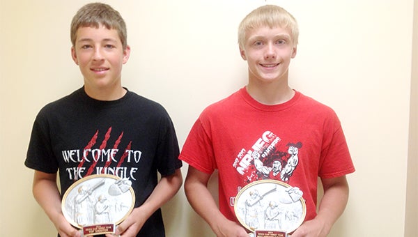 Collin Christenson, left, of the NRHEG clay target team was presented with the Top Shooter award and Alex Buckmeier won the Most Improved Shooter award. — Provided