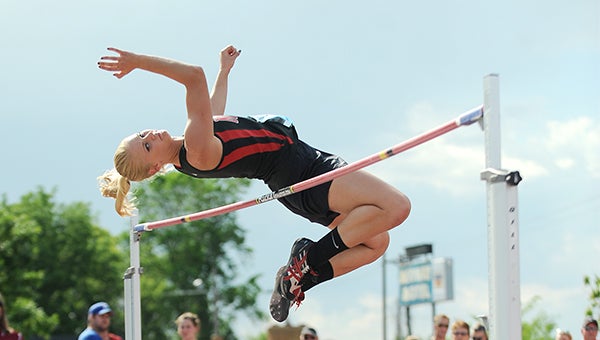 Carlie Wagner of NRHEG clears 5 feet, 5 inches in the high jump Friday at the Class A state track meet at Hamline University. The leap gave Wagner her second state title in the high jump. She went on to clear 5-6. — Micah Bader/Albert Lea Tribune