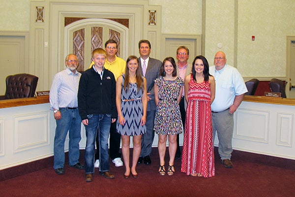 The Freeborn County Board of Commissioners awarded five Freeborn County high school seniors $500 scholarships on May 20. Pictured in the back row from left are Commissioner Jim Nelson, Commissioner Dan Belshan, Commissioner Christopher Shoff, Commissioner Glen Mathiason and Commissioner Mike Lee. Pictured in the front row from left are Samuel Johnson, Anna Marie Anderson, Karina Skov and Brittany Waters.  Missing is Elizabeth Ogunkanbi. – Provided