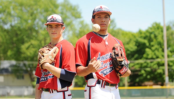 Johnathan Fleek, left, and Makael Lunning of the Albert Lea Legion Post 91 baseball team stand Friday at Hayek Field. Both players are former Big Nine All-Conference selections and both will play baseball at the college level next year. — Micah Bader/Albert Lea Tribune