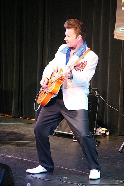 Richie Lee picks his guitar Saturday night at the Marion Ross Performing Arts Center in Albert Lea. His Des Moines-based band, Richie Lee and the Fabulous 50s, performed as part of Eddie Cochran Weekend. The box office reported selling 122 tickets for his show.  – Tim Engstrom/Albert Lea Tribune