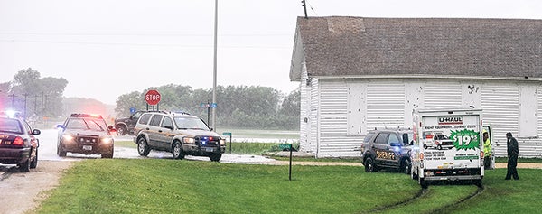 Mower County Sheriff’s deputies and Austin Police officers headed off a U-Haul at the intersection of County Road 4 and Highway 218 after a brief chase in the county Thursday morning. – Eric Johnson/Albert Lea Tribune