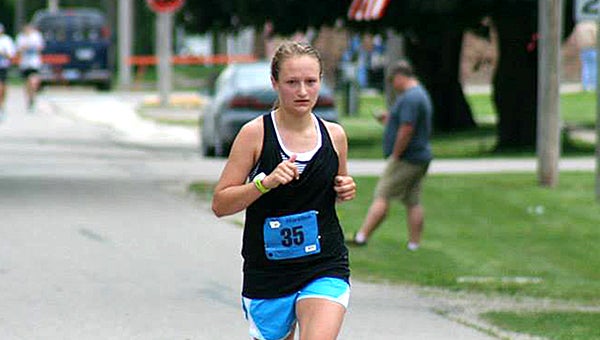 Emma Behling, a 2014 graduate of Albert Lea High School, nears the finish line of the Marathon to Marathon on June 14 from Storm Lake to Marathon, Iowa. She finished with a time of 4 hours, 25 seconds, which tied the course record for her age division. This was her second marathon. — Provided