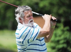 Carl Forderer of Wells swings his driver at north of the clubhouse at Oak View Golf Club.