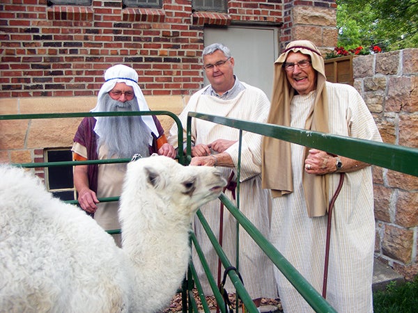 First Presbyterian Church of Albert Lea hosted the Wilderness Escape Vacation Bible School earlier this month. George Kessel (Moses), Steve Johnson and Richard Polley play herders as they hosted a petting zoo that included a 4-week old camel, named Nora. – Provided