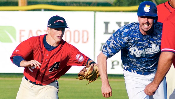 Austin Greyhounds shortstop Johnathan Fleek chases down Rochester’s Buzz Hannahan in Marcusen Park Sunday. Fleek was 2-of-4 with a double, but the Greyhounds lost 7-0. Fleek, who played for Albert Lea in the spring, was the Tribune’s All-Area baseball Player of the Year. He also plays for the Albert Lea Legion Post 56 baseball team. Rocky Hulne/Albert Lea Tribune