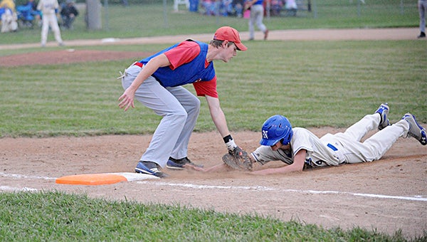 First Baseman Zach Costello of Northwood-Kensett tags a North Iowa runner for the second out of a double play in the fourth inning Monday at Lake Mills High School during the first round of the Class 1A, District 4 playoffs. — Jacob Tellers/Albert Lea Tribune