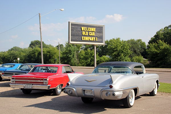 Classic cars line up last week at Southside Custom during an Old Car Company Club meeting. – Erin Murtaugh/Albert Lea Tribune