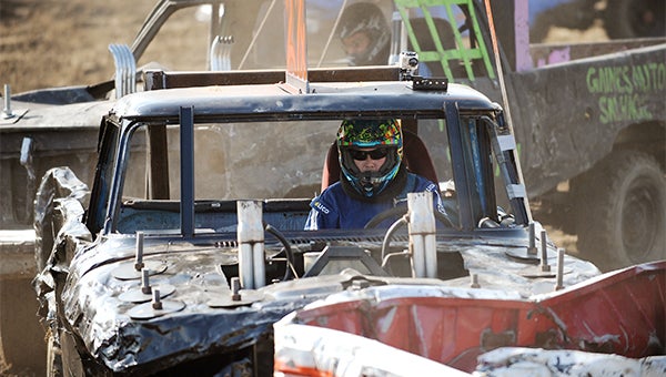 Nate Heidecker gets pinned between two vehicles Sunday during the demolition derby in the trucks division at the Freeborn County Fair. Heidecker took sixth place out of nine trucks. — Micah Bader/Albert Lea Tribune