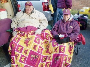 Joel Nelson and his wife Marlo Nelson tailgate before a Gopher game. This was a favorite family activity, as Joel was a huge Gopher fan. – Provided