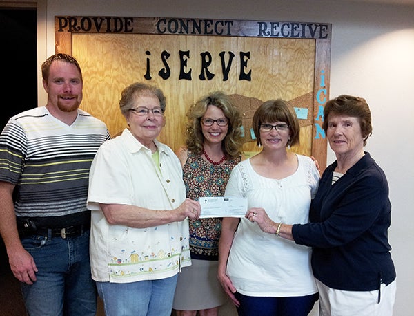 The annual First Lutheran spuds and splits fundraiser proceeds are given equally to the Salvation Army and the Rock for the food service programs. $515 was donated to each. Pictured are, from left, Robert Modderman, Eunice Hatleli, DeeAnn Berglund, Robin Gudal and Deloris Fligge. – Provided