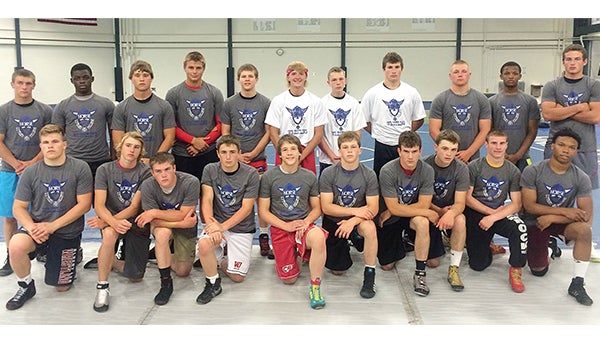 Albert Lea wrestler Tim Christianson, front row far left, was chosen as Camper of the Day July 10 at the Luther College Wrestling Camp in Decorah, Iowa. — Provided