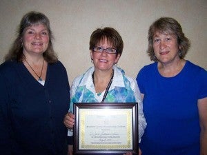 Cindy Gaudian, left, and Cheryl Lonning, right, recognize Machar Kingstrom with St. John’s Lutheran Community for their efforts to become a breastfeeding friendly worksite. – Provided