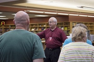 United South Central Superintendent Jerry Jensen talks to a tour group in the new USC school’s media center, which has books for all students kindergarten through 12th grade. – Hannah Dillon/Albert Lea Tribune