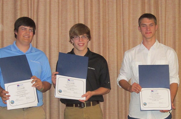 From left, Dalton Carlson, Benjamin Kelly and Blair Bonnerup were recognized for their involvement with the Youth Apprenticeship Program.  Not pictured is Regin Reyes. – Provided