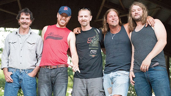 Bad Monkey played July 12 at Harmony Park in Clarks Grove. They are, from left, Clete Hering, Tony Madson, Russ Wallin, Seth Larson and Tristan Sather. – Colleen Harrison/Albert Lea Tribune