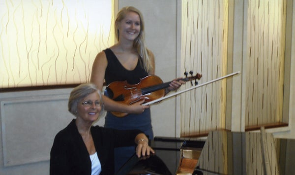 A viola and vocal concert was presented by Kristine Volz, right, who is the daughter of Scott and Lori Volz of Blue Earth. Volz performed a one-hour concert Aug. 1 at Mayo Clinic Health System of Albert Lea. She is a junior at Augsburg College, majoring in chemistry with a minor in music. Volz is a long-time student of Sharon Astrup-Scott, left, who accompanied her during the concert. – Provided