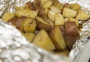 Tribune editor Tim Engstrom grilled up some Twin Lakes potatoes complete with Lawry's Seasoning Salt. — Colleen Harrison/Albert Lea Tribune
