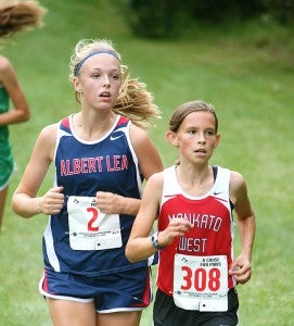 Grace Chalmers runs Friday at the Faribault Invitational in North Alexander Park. — Bryce Gaudian/For the Albert Lea Tribune