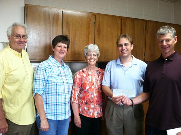 Kevin Dulitz, trustee of the Albert B. Cuppage Foundation, presents a check to Albert Lea Civic Music Association board of directors and officers Brian Wolfe, Diane Heaney, Judy Hellie and Mark Nechanicky. Not pictured are Henry Savelkoul, Don Savelkoul and Susie Petersen, trustees of Albert B. Cuppage Foundation. – Provided