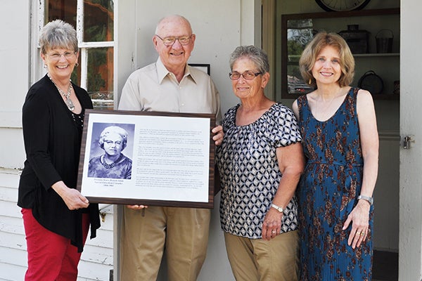 Pat Mulso accepted the plaque from Roger Lonning, who spearheaded the effort to commemorate the accomplishments of Florence Adair. Carol Adair, Florence’s daughter and Joan Claire Graham, daughter of Alpha Class teacher Cookie Graham, attended the presentation. — Provided