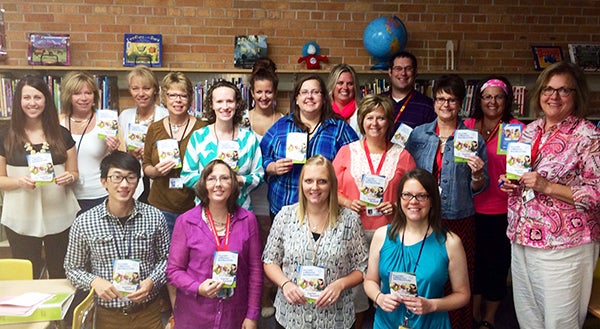 The manager of the Albert Lea WalMart awarded 20 Hawthorne Elementary teachers with $50 gift cards to WalMart to purchase nutritious snacks or school supplies for their classrooms. – Provided