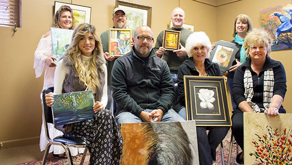 Nine artists will be featured at this year’s Celebrating the Arts and Artists. Pictured in the front row, from left, are May Ya-ya, James Petersen, Judy Gannon and Kay Hay. Pictured in the back row, from left, are Mary Schulte, Chris Charlson, David Lenz and Debb Peterson. Not pictured is Melinda Ewert. – Hannah Dillon/Albert Lea Tribune
