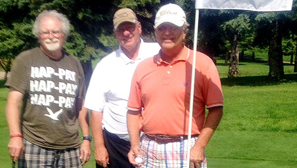 Paul Linnes hit a hole-in-1 Aug. 29 using a hybrid at Green Lea Golf Course on Hole 2, a par 3 that is 171 yards. From left are Linnes’ playing parners Paul Evenson and Don Richter and Linnes. — Provided